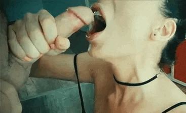 A woman jerks off a man and he cums in her mouth Gif 