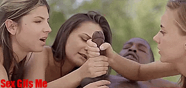 Three beautiful girls gives a mans big black cock a hand job at once making it cum.