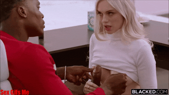 A hot blonde girl gives a black mans BBC a hand job before giving him a blow job.